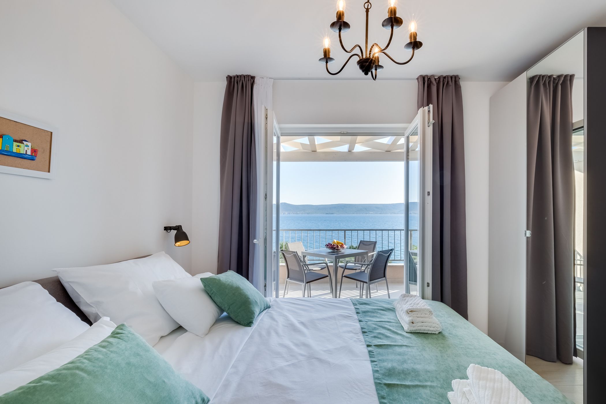 Villa Diana apartman 1 — spavaća soba s bračnim krevetom